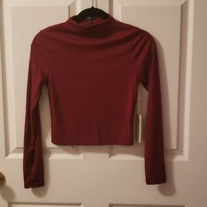 Long sleeved mock neck top